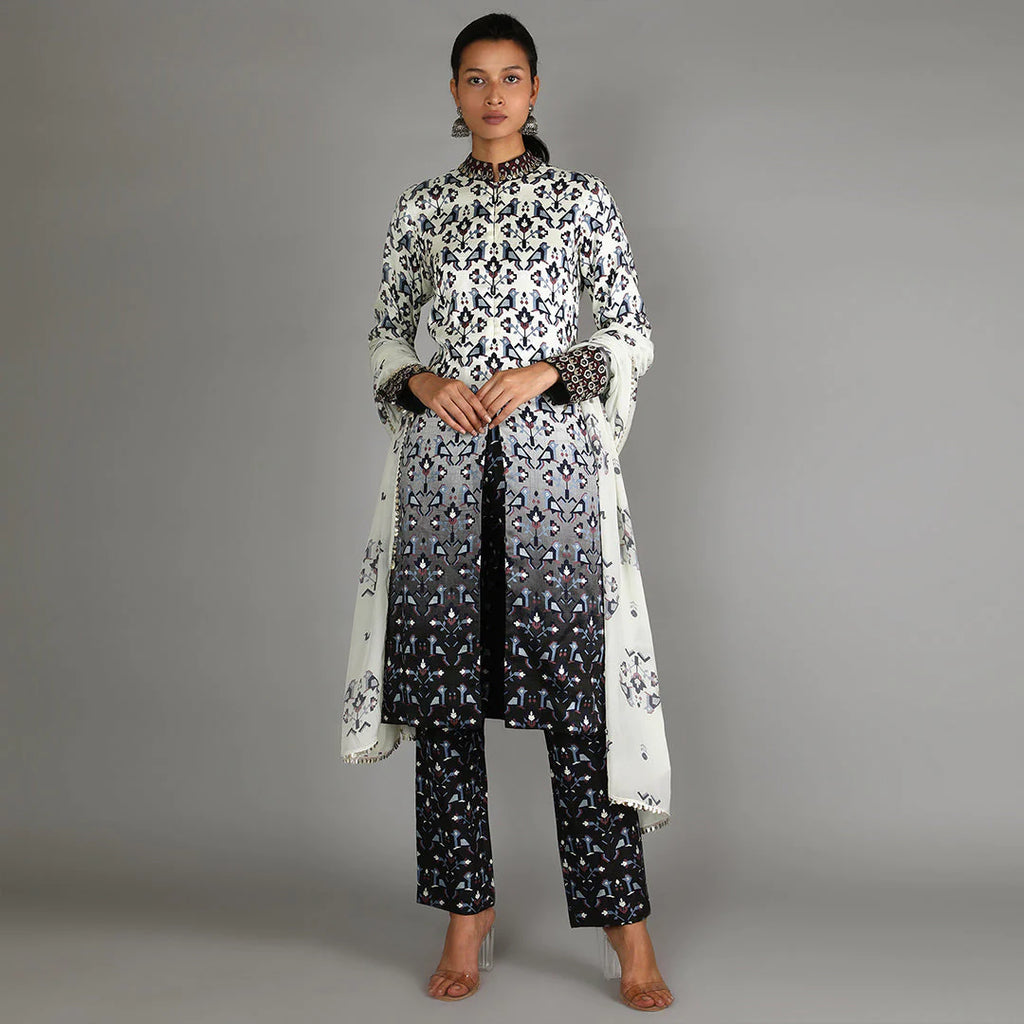 BLACK AND WHITE OMBRE GEOMETRIC DAMASK PRINT JACKET WITH BLACK GEOMETRIC DAMASK PRINT PANT PAIRED WITH WHITE BIRD PRINT DUPATTA WITH EMBROIDERY DETAILING