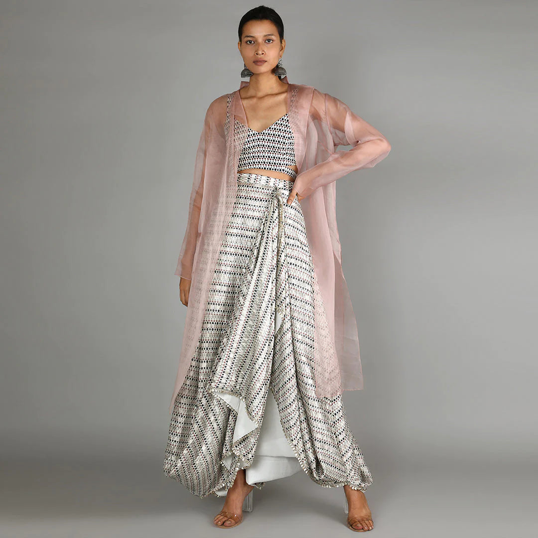 WHITE JAALI PRINT CHANDERI DRAPE SKIRT WITH PRINTED BUSTIER PAIRED WITH BLUSH PINK ORGANZA JACKET