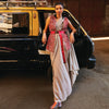 CONCRETE GREY PRE STITCHED CASCASE SAREE TEAMED WITH BUSTIER AND EMBELLISHED JACKET BELT: STYLING PURPOSE ONLY