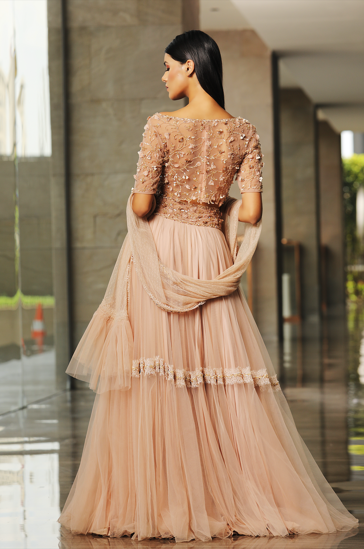 Katrina Kaif in Nude Sheer Back Blouse Lehenga Set