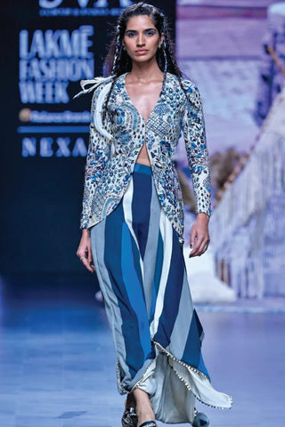 IVORY GEOMETRIC PRINT NUSHRAT DRAPED SKIRT AND BUSTIER TEAMED WITH A SIGNATURE STRUCTURED JACKET
