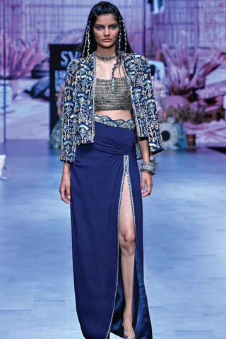IVORY GEOMETRIC PRINT NUSHRAT DRAPED SKIRT AND BUSTIER TEAMED WITH A SIGNATURE STRUCTURED JACKET
