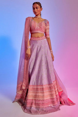 IVORY SAANJH FLORAL PRINT LEHENGA WITH CORAL EMBELLISHED BORDER AND BLOUSE TEAMED WITH A LILAC ORGANZA DUPATTA
