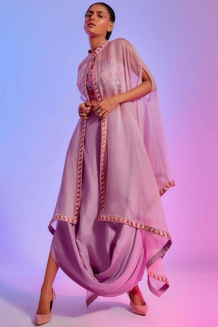 LILAC DRAPE SKIRT WITH EMBELLISHED BUSTIER TEAMED WITH A LILAC ORGANZA CAPE