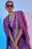 PURPLE SAANJH FLORAL PRINTED SAREE WITH HOT PINK EMBELLISHED BORDER TEAMED WITH A PRINTED BUSTIER AND JACKET
