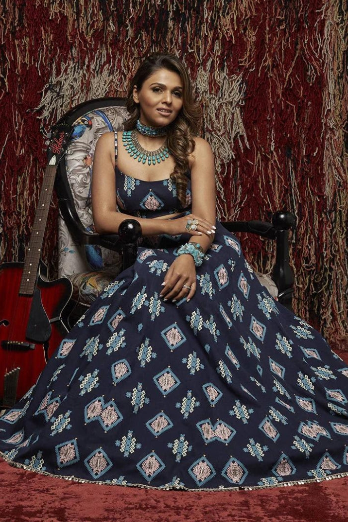DARK BLUE PRINTED DENIM BUSTIER PAIRED WITH PRINTED LEHENGA