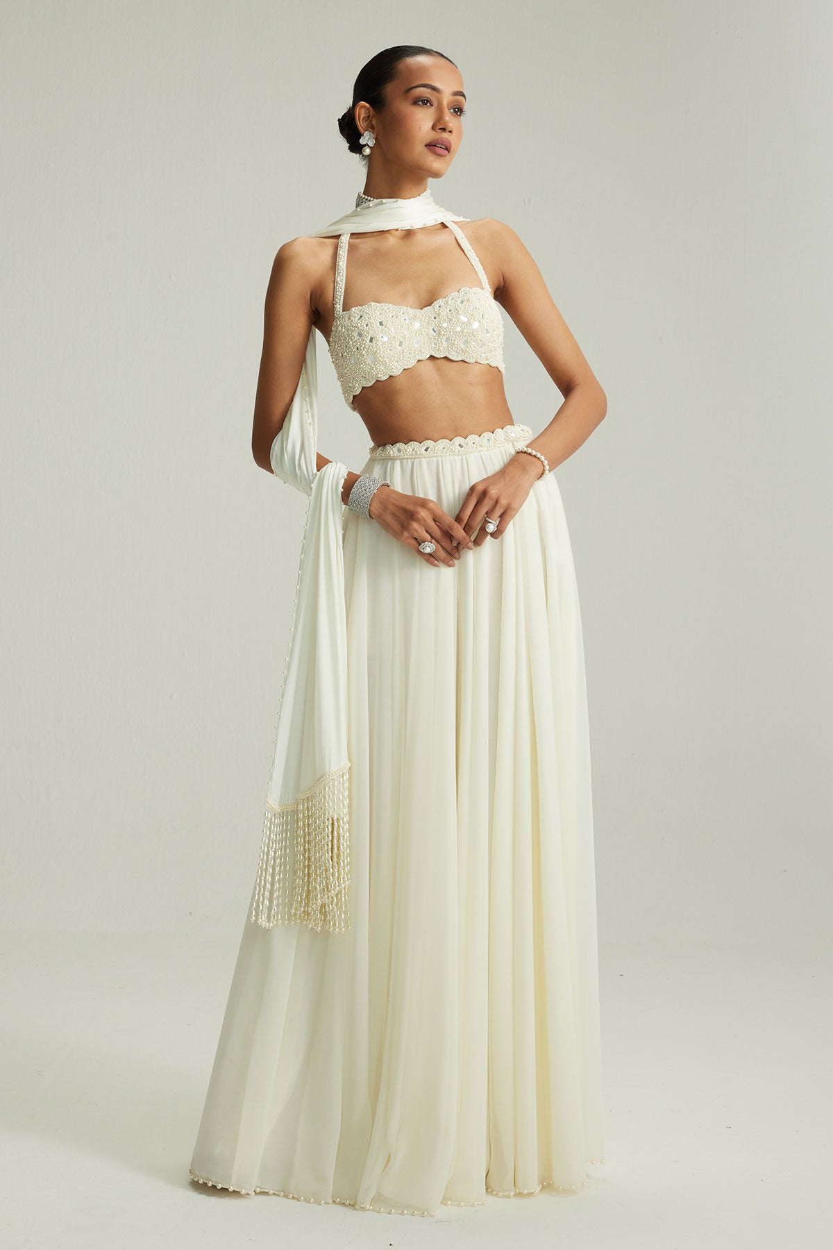 Off White Skirt Set With Halter Neck Blouse