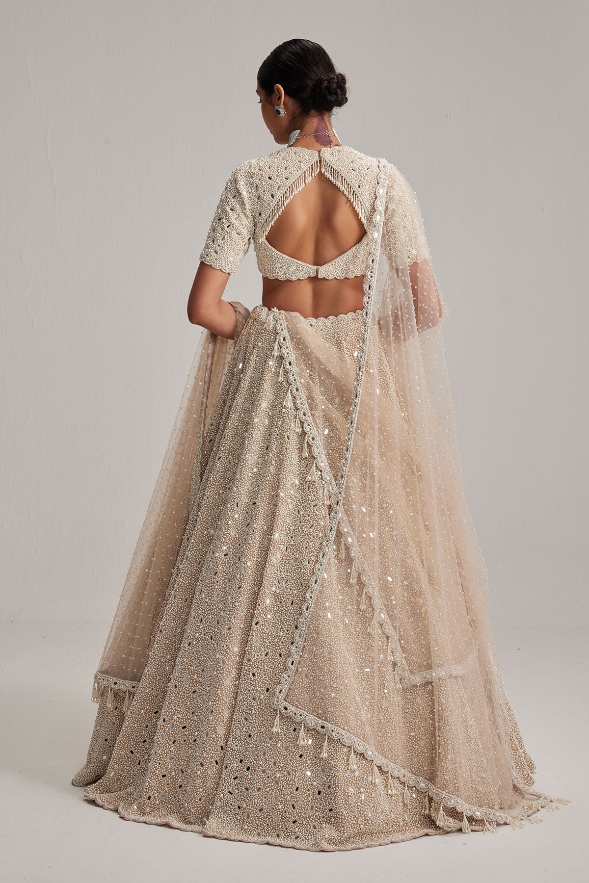 Light Beige dense mirror and pearl lehenga set with high neck blouse and Double Dupatta