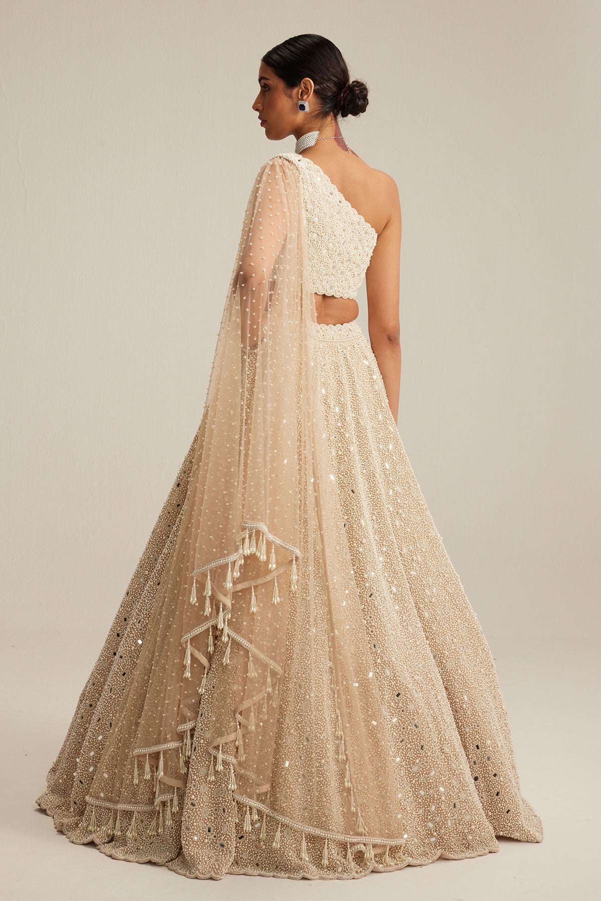 Light Beige Dense mirror and pearl one shoulder lehenga set