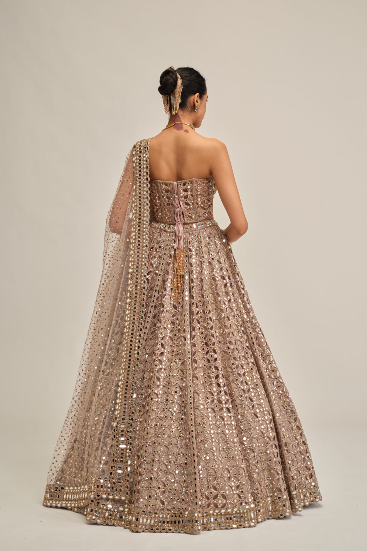 Ash Pink Circular Cutwork Lehenga With Corset Set