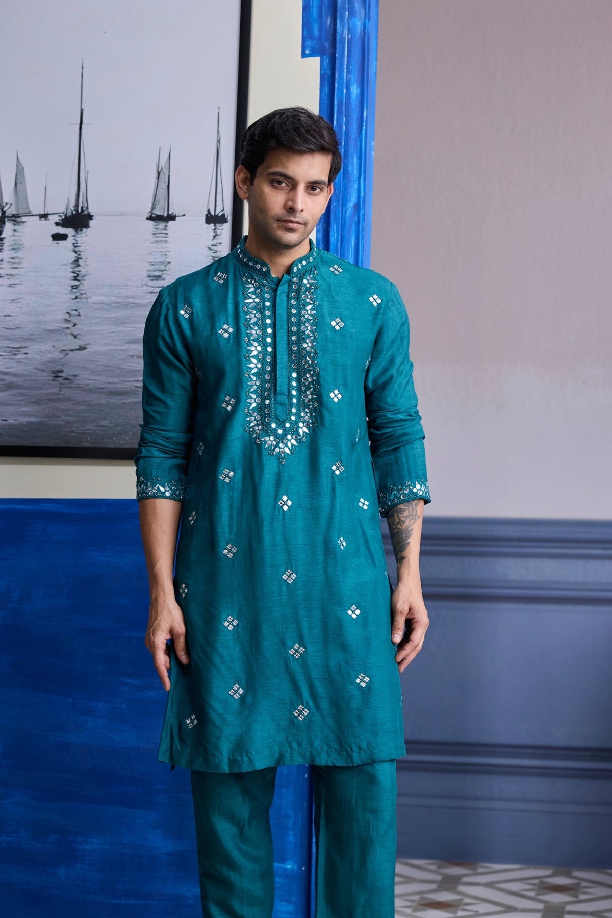 Teal Green Embroidered Kurta With Print Highlighted Bundi Jacket Paierd With Solid Pants