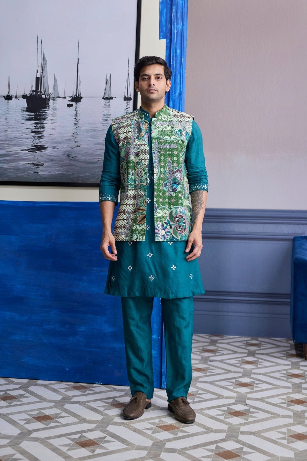 Teal Green Embroidered Kurta With Print Highlighted Bundi Jacket Paierd With Solid Pants
