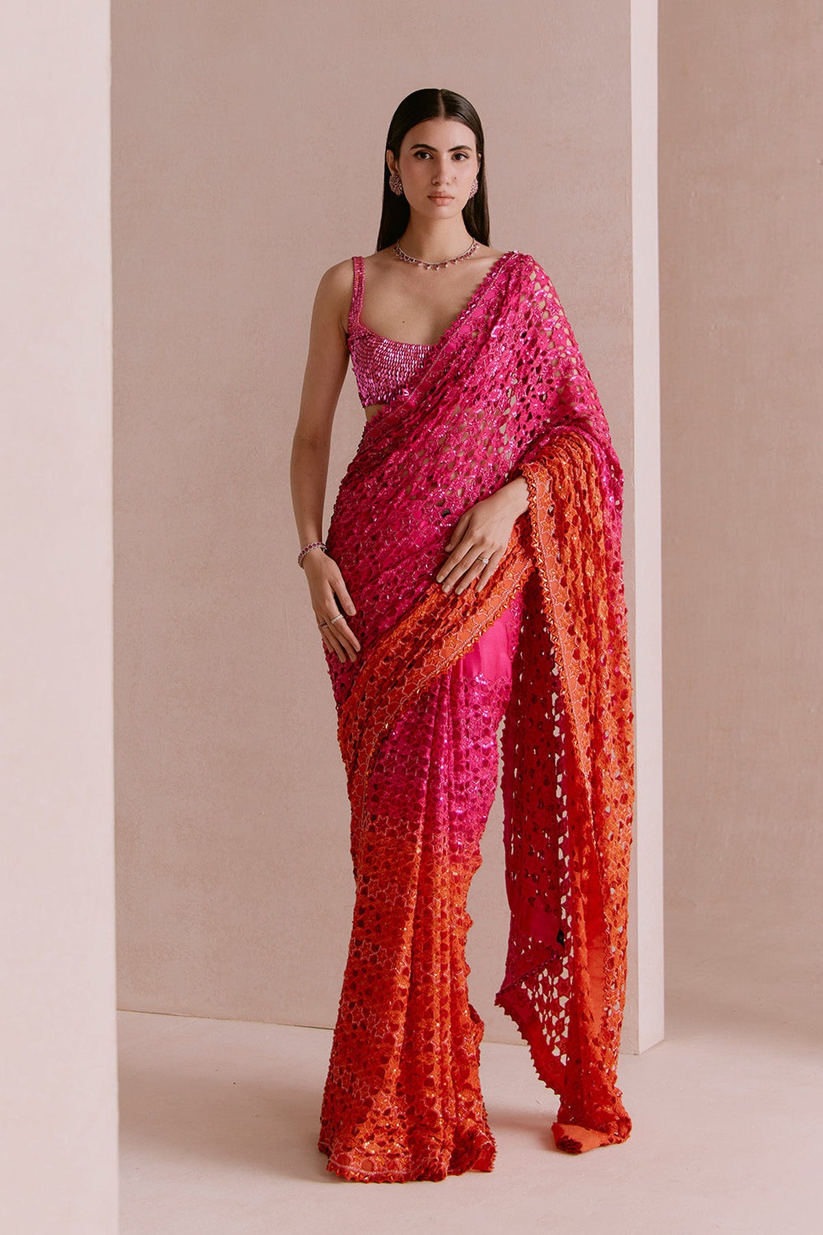 pink to orange cutwork saree set