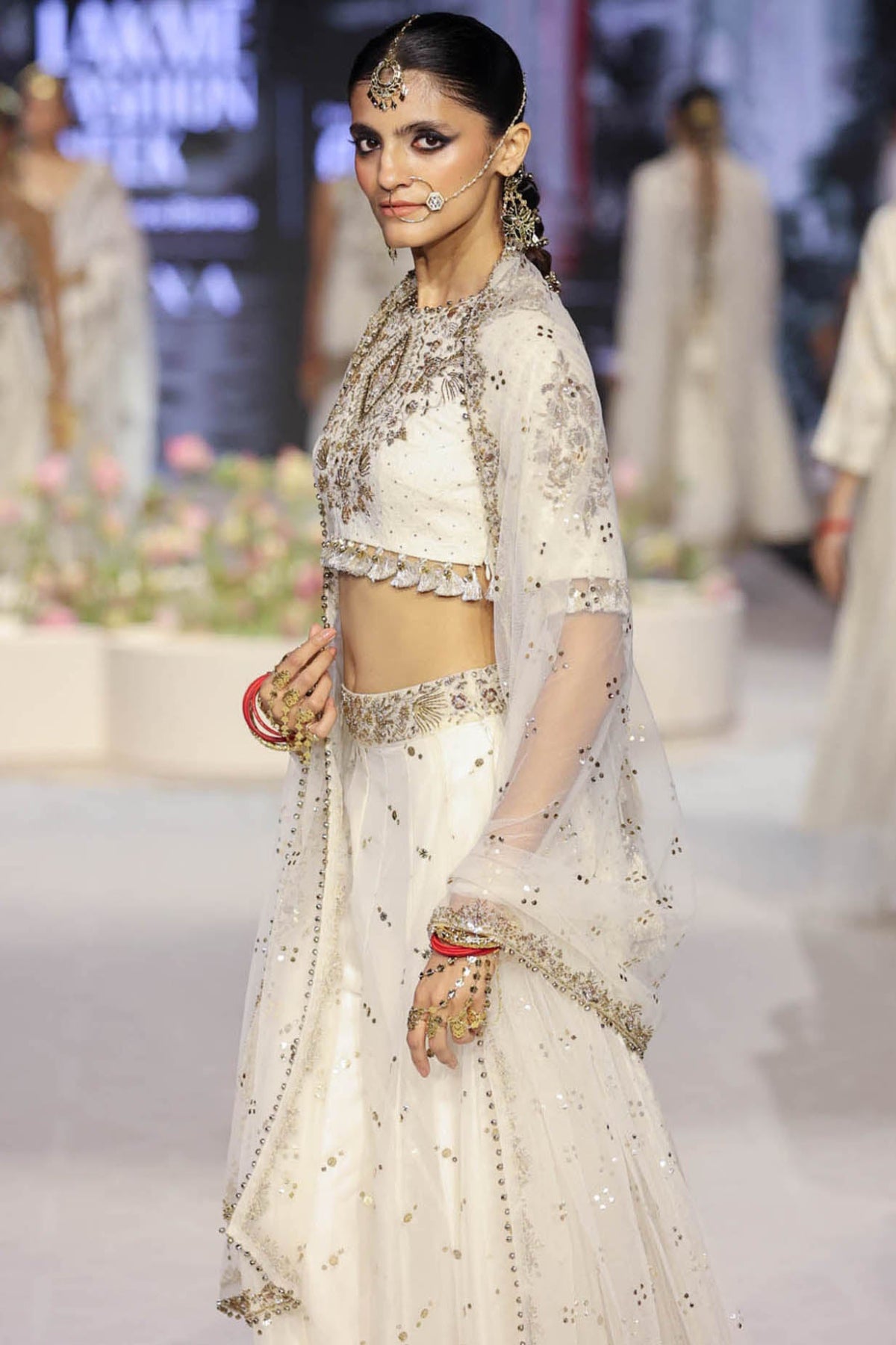 Shakira Off White Embroidered High Low Choli With Sharara And Dupatta
