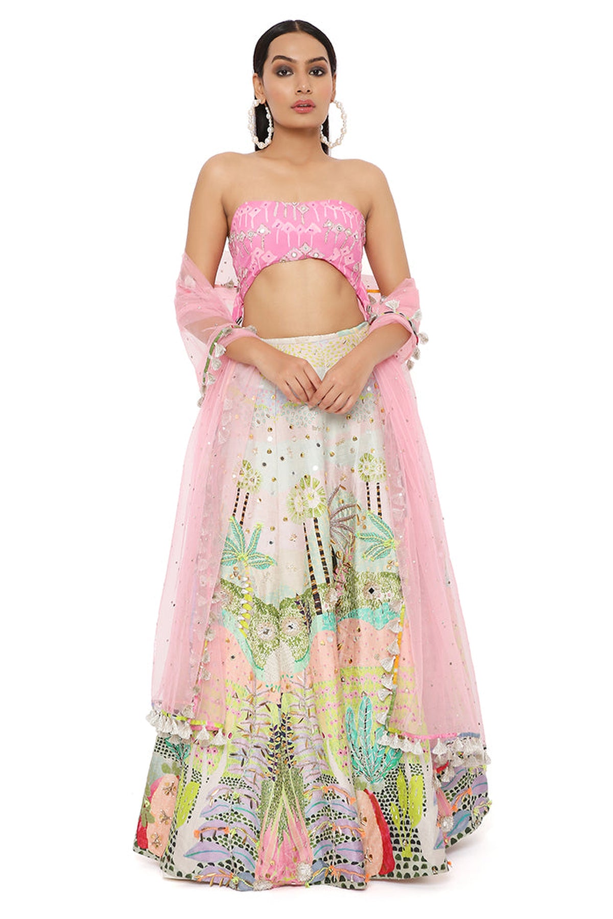 IVANA PINK KITE PRINT EMBROIDERED BUSTIER WITH TROPICAL PRINT EMBROIDERED LEHENGA AND MUKAISH NET DUPATTA
