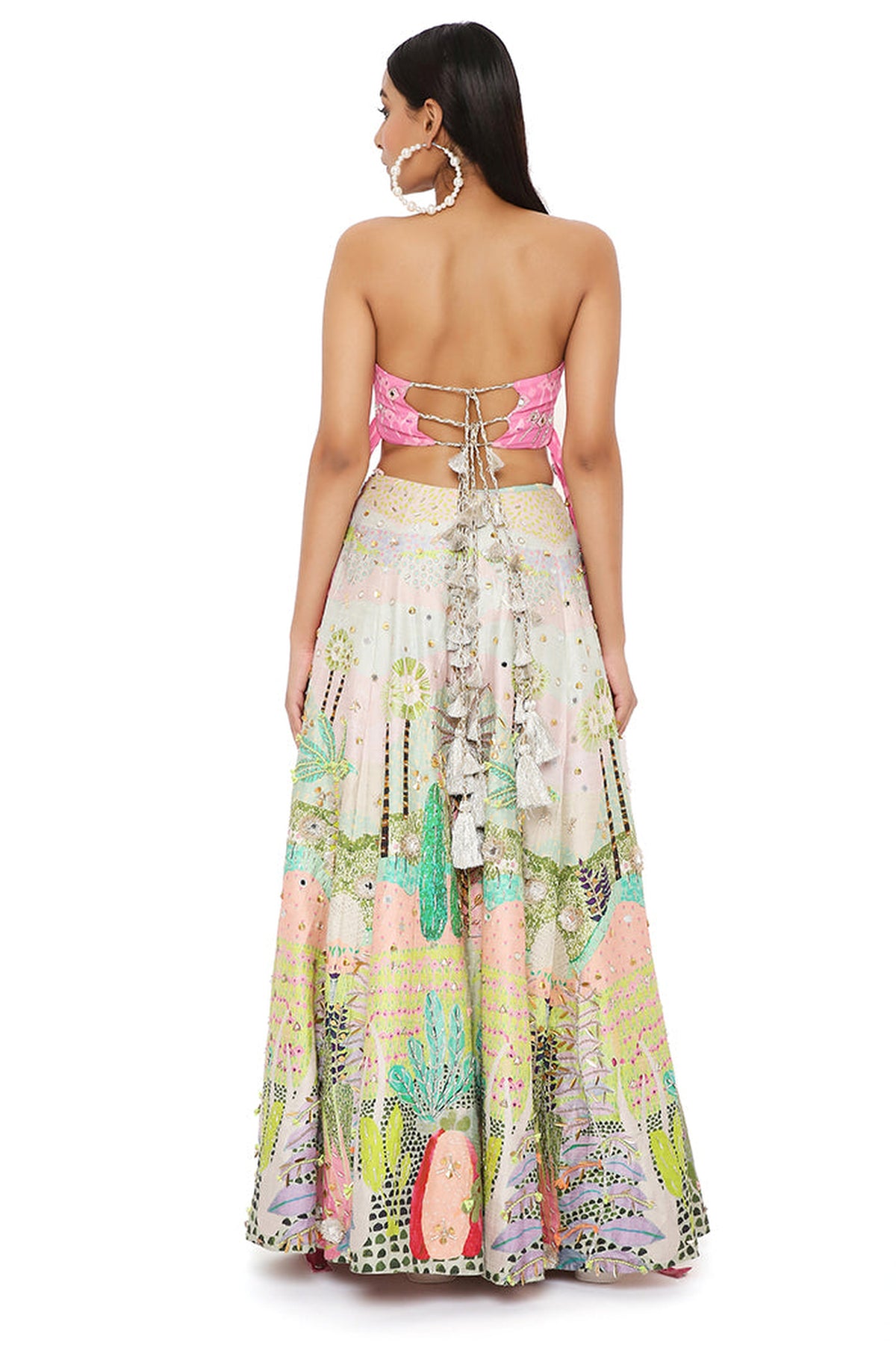 IVANA PINK KITE PRINT EMBROIDERED BUSTIER WITH TROPICAL PRINT EMBROIDERED LEHENGA AND MUKAISH NET DUPATTA