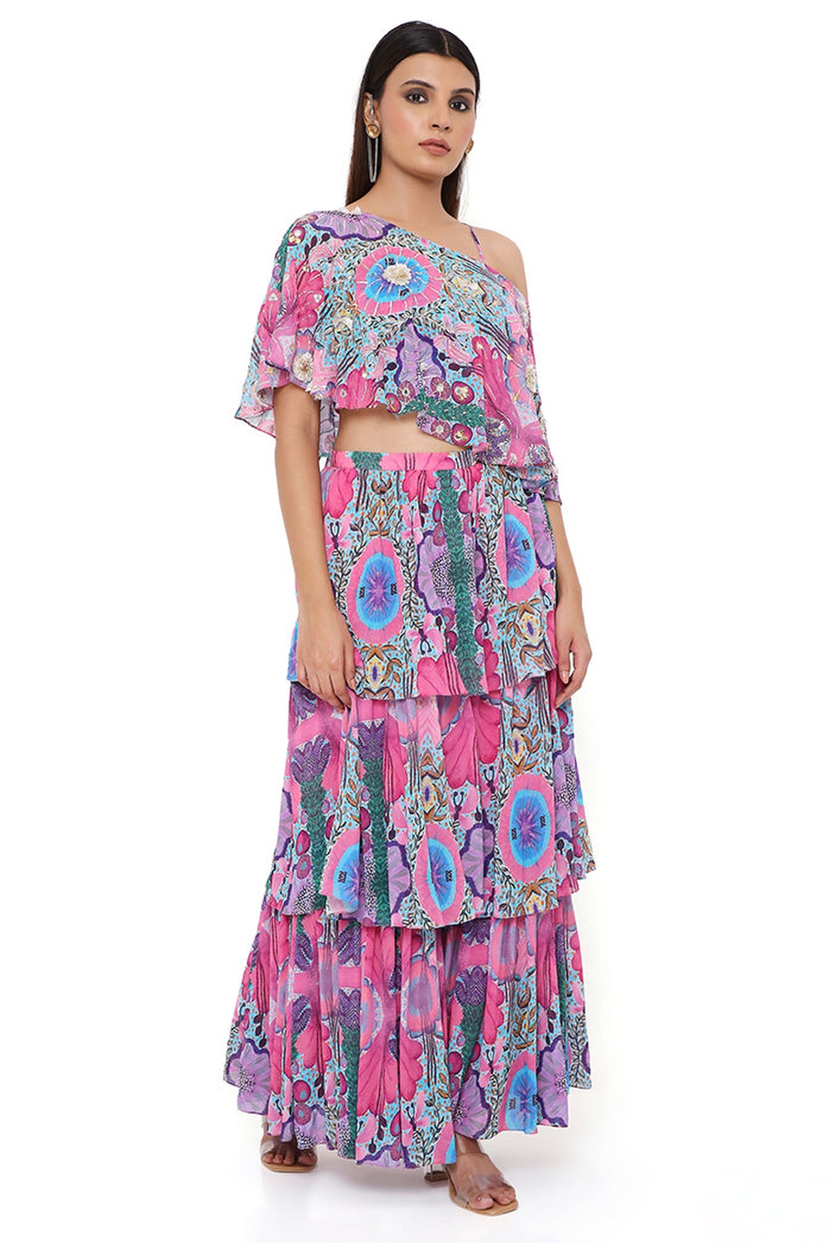 PINK ENCHANTED PRINT GEORGETTE EMBROIDERED ONE SHOULDER CAPE WITH A BUSTIER AND FRILL SHARARA