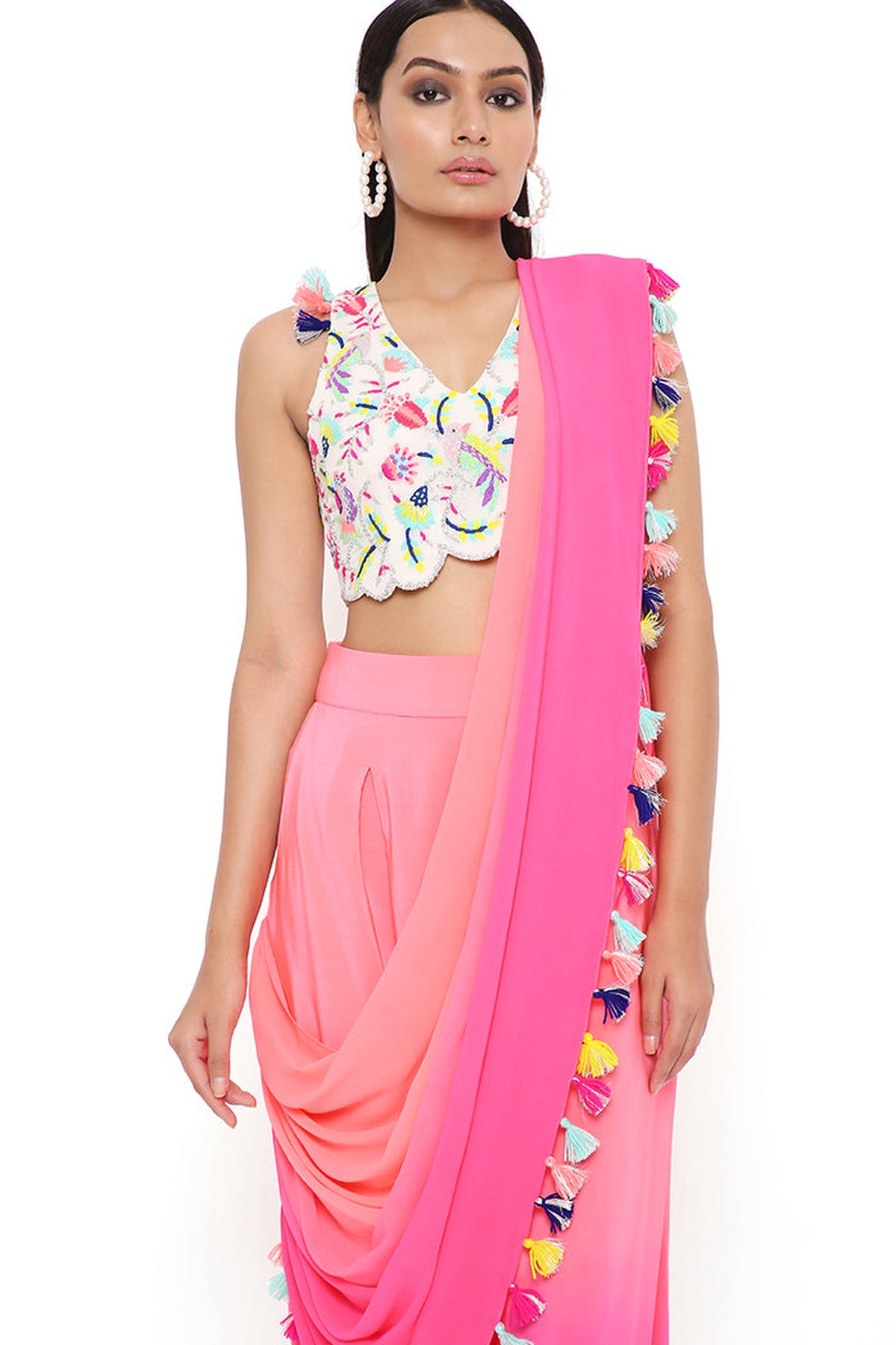 STONE GEORGETTE EMBROIDERED CHOLI WITH CORAL AND PINK CREPE SHADED LOW CROTCH AND GEORGETTE ATTACHED DRAPE