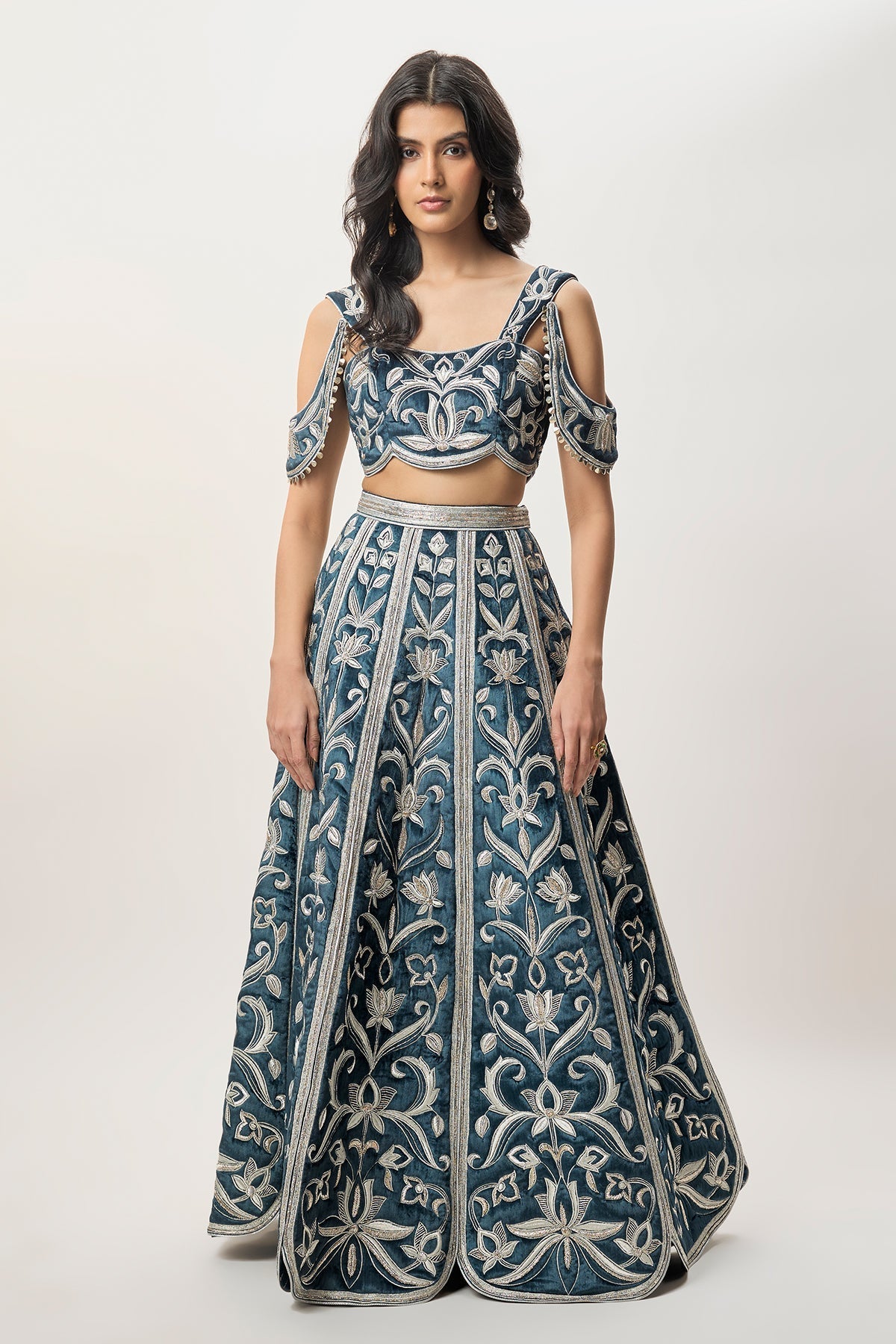 Sahar Navy Blue Velvet Quilted Embroidered Choli With Attached Embroidered Bajuband And Quilted Lehenga.