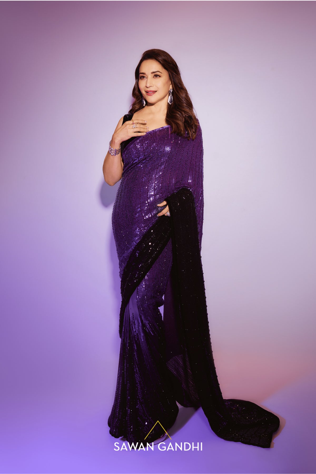 Madhuri Dixit in Royal purple to black ombrÃ© saree