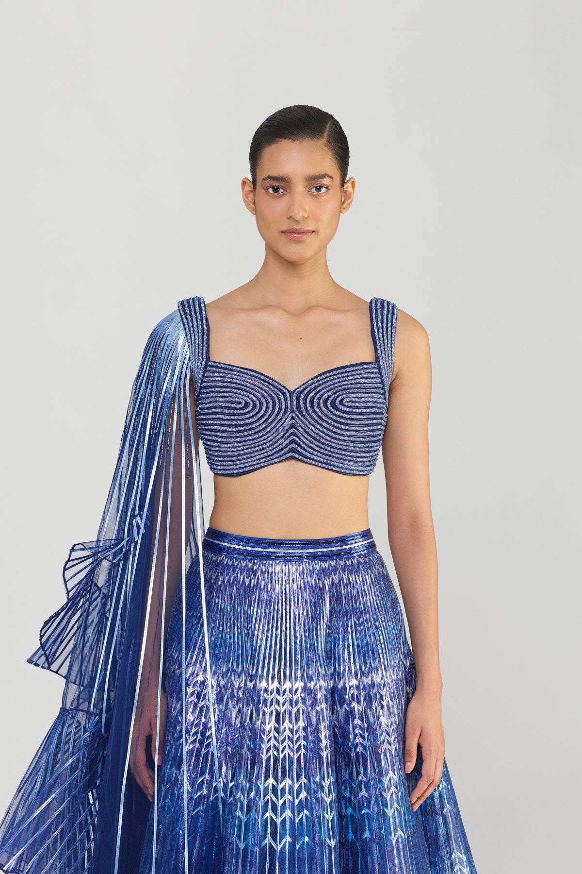 Kriti Sanon in Metallic Fluted Tulle Printed Skirt With Ruffle Drape And Structured Crystalvein Top