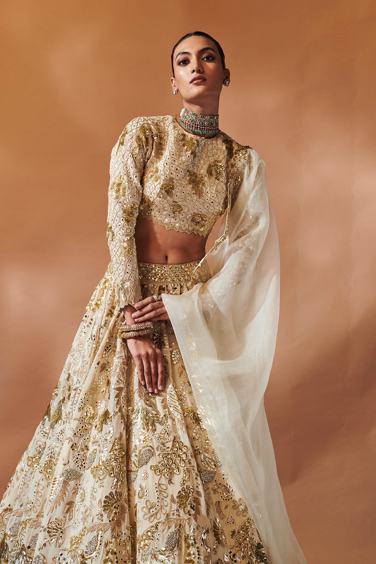 IVORY AND GOLD HEAVILY EMBROIDERED LEHENGA SET