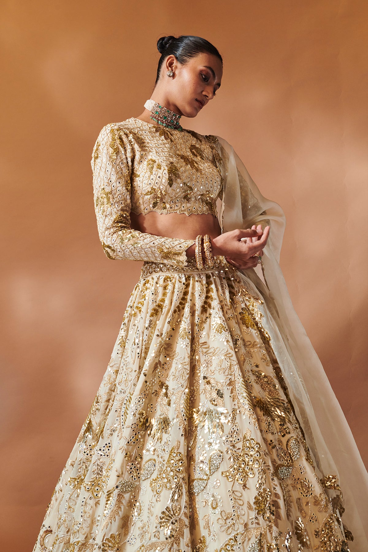 IVORY AND GOLD HEAVILY EMBROIDERED LEHENGA SET