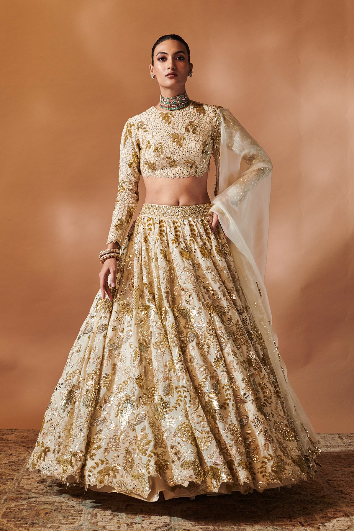 IVORY AND GOLD HEAVILY EMBROIDERED LEHENGA SET