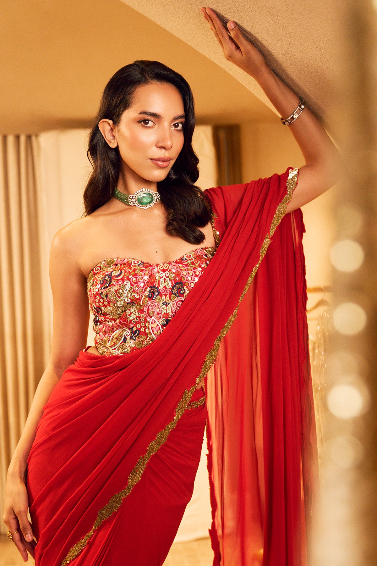 RED PRE DRAPED SAREE SET WITH A CORSET BLOUSE