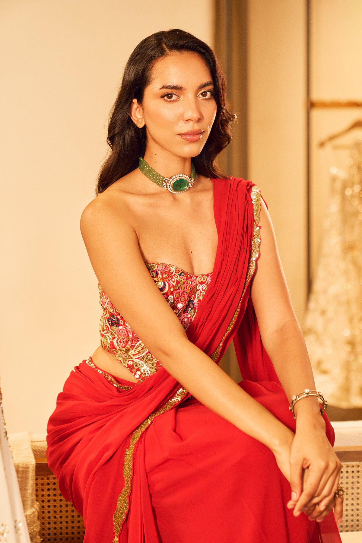 RED PRE DRAPED SAREE SET WITH A CORSET BLOUSE