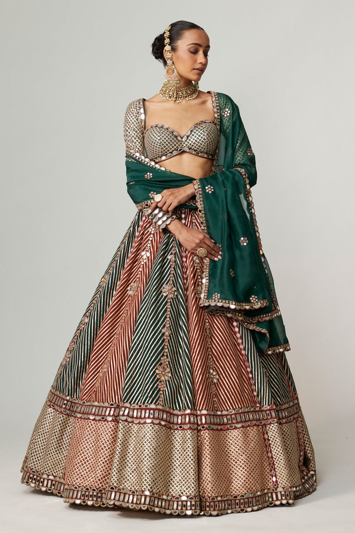 CRANBERRY FLOWER LINEAR LEEHNGA WITH FULL SLEEVE BLOUSE.