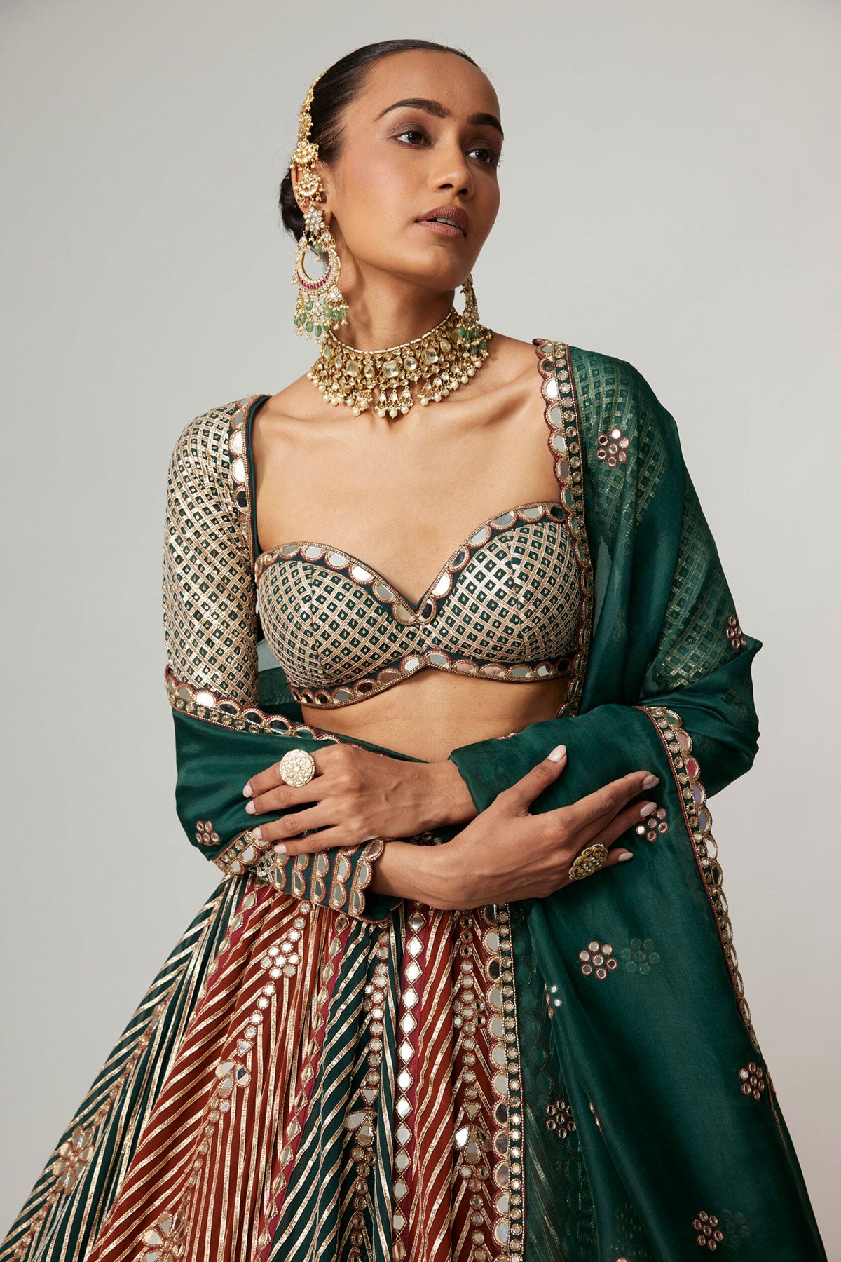 CRANBERRY FLOWER LINEAR LEEHNGA WITH FULL SLEEVE BLOUSE.