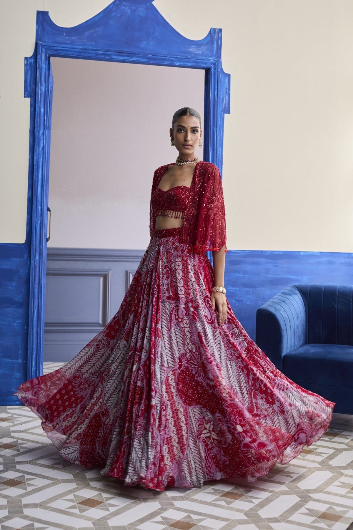 Red Embroidered Blouse With Tassel Cape Jacket & Floral Lehenga Set
