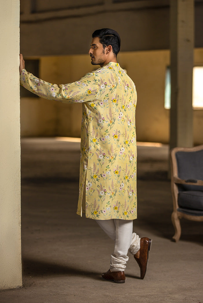 YELLOW PRINTED SILK KURTA WITH OFF WHITE COTTON SILK CHURIDAR