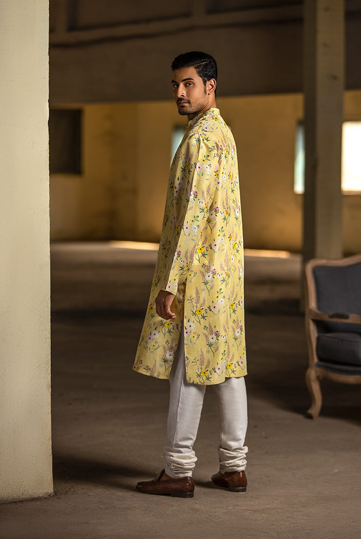 YELLOW PRINTED SILK KURTA WITH OFF WHITE COTTON SILK CHURIDAR