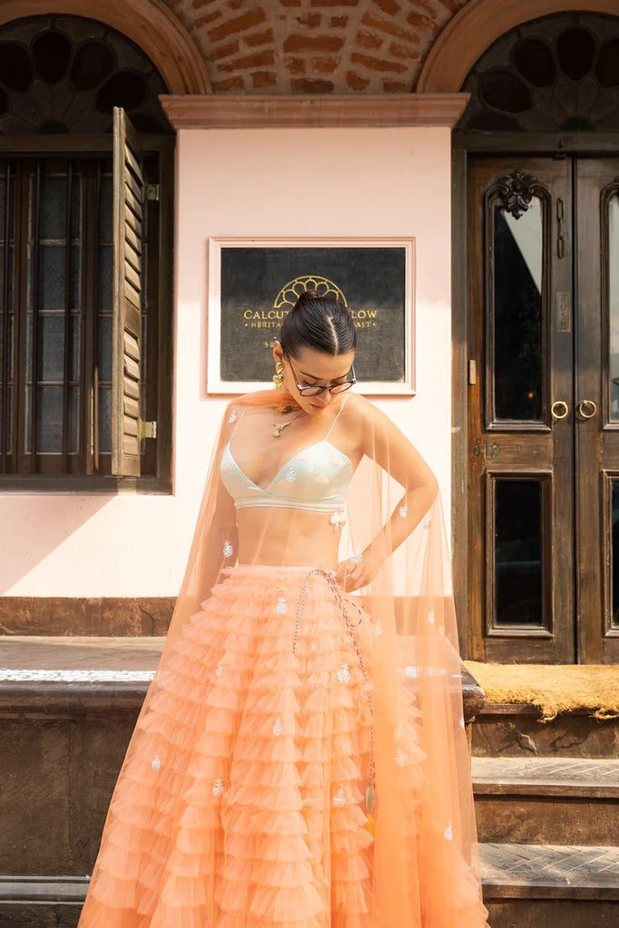 CLOUDS IN A SUNSET LEHENGA