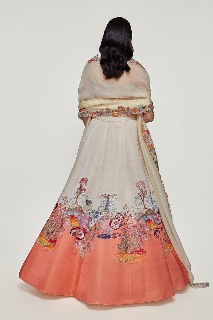 Ivory And Peach Divergence Silk Appliquéd And Embellished Lehenga With Blouse And Cutwork Organza Dupatta