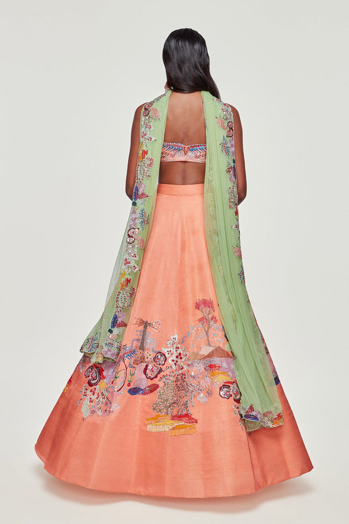 Peach Divergence Silk Appliquéd and Embellished Lehenga With Blouse And Cutwork Tulle Dupatta