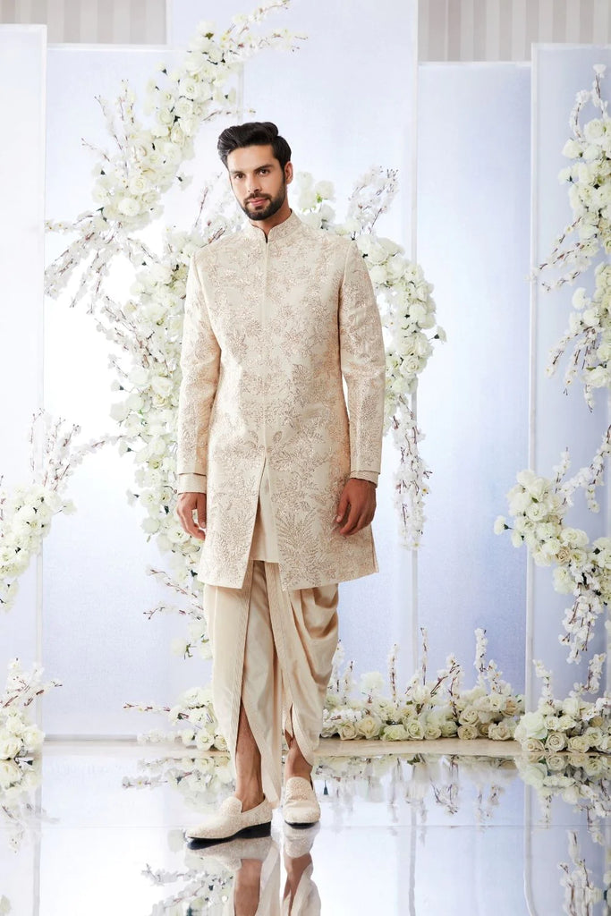 White and 2025 gold sherwani
