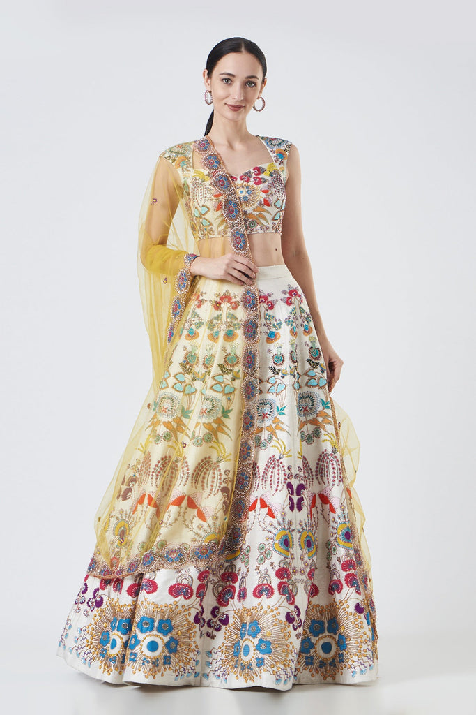 Ivory Paper Dolls Raw Silk Appliquéd And Embellished Lehenga With Blouse And Cutwork Tulle Dupatta