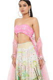IVANA PINK KITE PRINT EMBROIDERED BUSTIER WITH TROPICAL PRINT EMBROIDERED LEHENGA AND MUKAISH NET DUPATTA