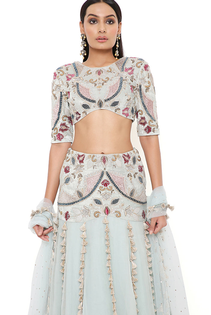 KRESHA POWDER BLUE EMBROIDERED CHOLI AND VELVET EMBROIDERED BASQUE ORGANZA LEHENGA WITH NET DUPATTA