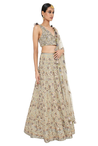 IVANA PINK KITE PRINT EMBROIDERED BUSTIER WITH TROPICAL PRINT EMBROIDERED LEHENGA AND MUKAISH NET DUPATTA