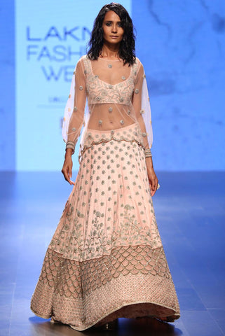 Lisa Orange Bandhani Embroidered Choli And Skirt With Attached Soft Net Churidar